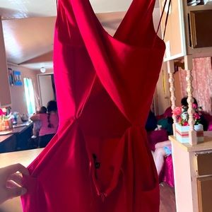 Red backless romper with pockets